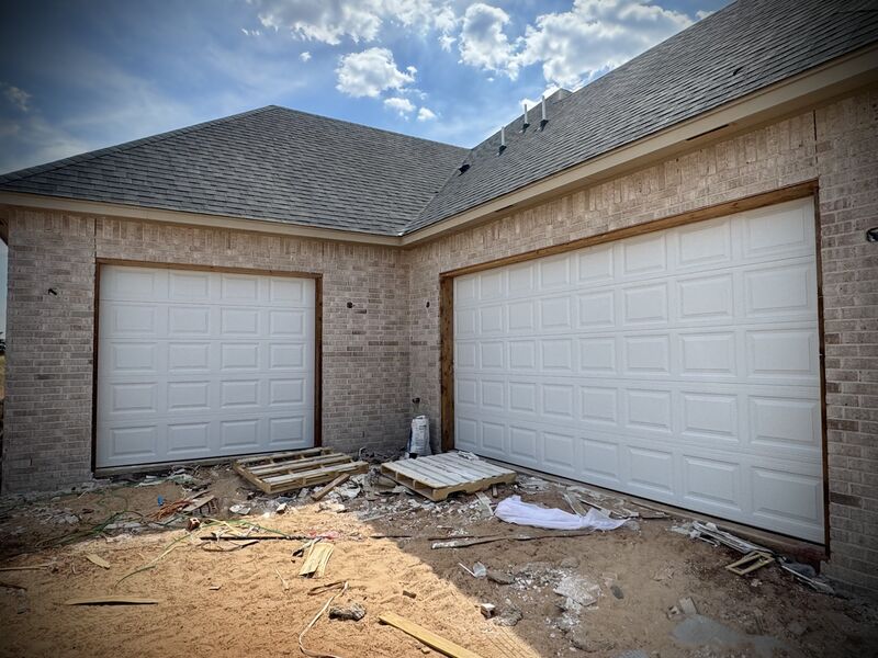 After: New home: two garages closed up