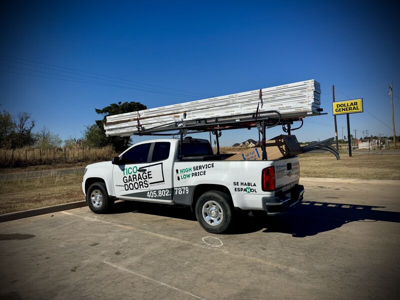 Tico Garage Doors truck loaded with new garage door panels on the rack